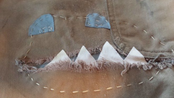 Hand sewing to ensure patches stay in place. (image: L. Weldon)