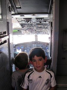 My sons were waiting to sit in the cockpit of an Air Force T-43 trainer, which is a modified Boeing 737 that's used for training navigators. Photo: Patricia Vollmer.