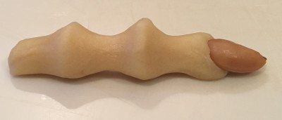 Just rolled "finger." Press almond firmly into dough as "nail." Add knuckle creases. Photo from the author.