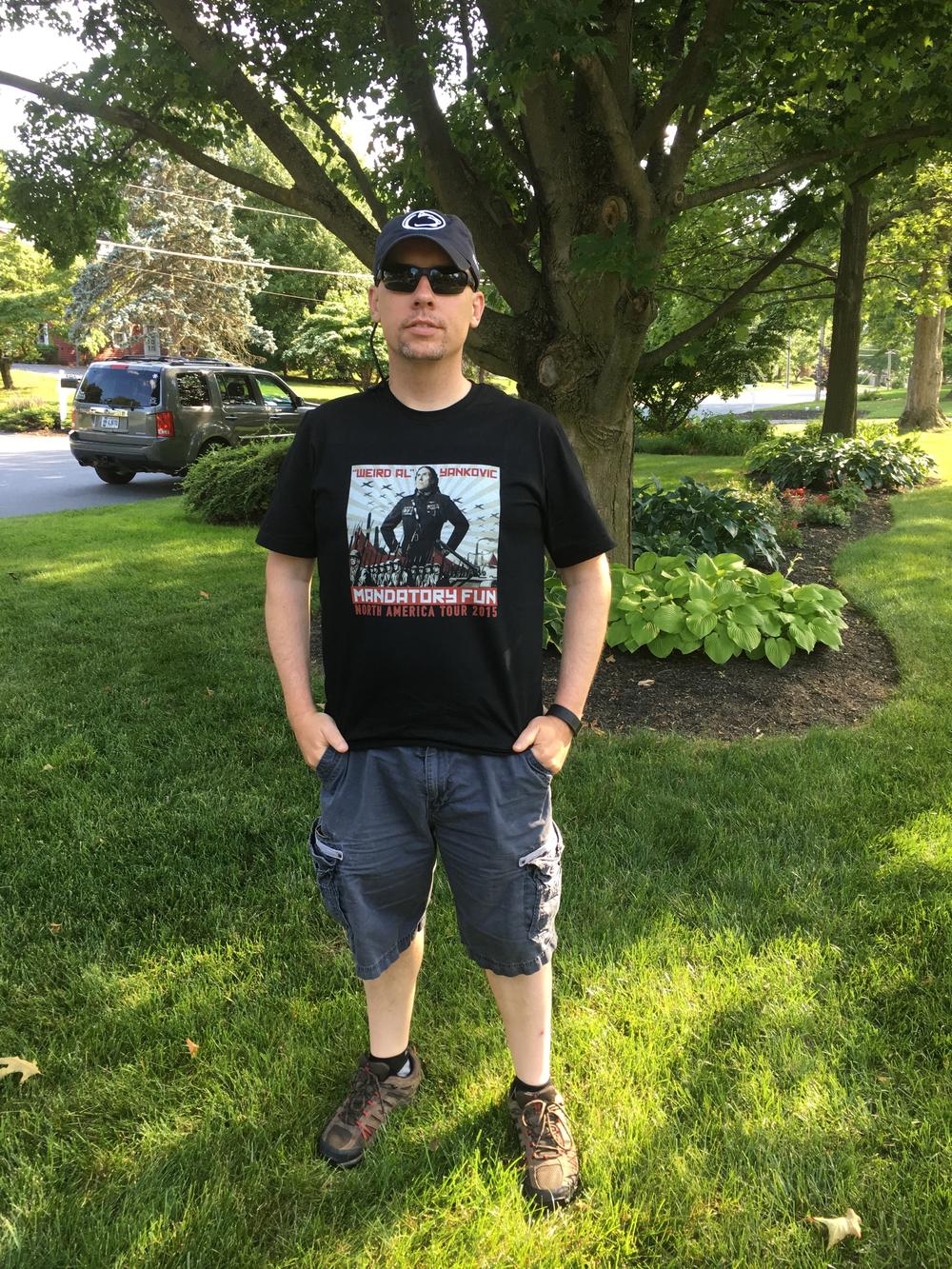 Here's my husband in his usual civilian attire. Here in Colorado he's happiest in a geeky tee and comfy shorts with lots of pockets. Image credit: Patricia Vollmer.