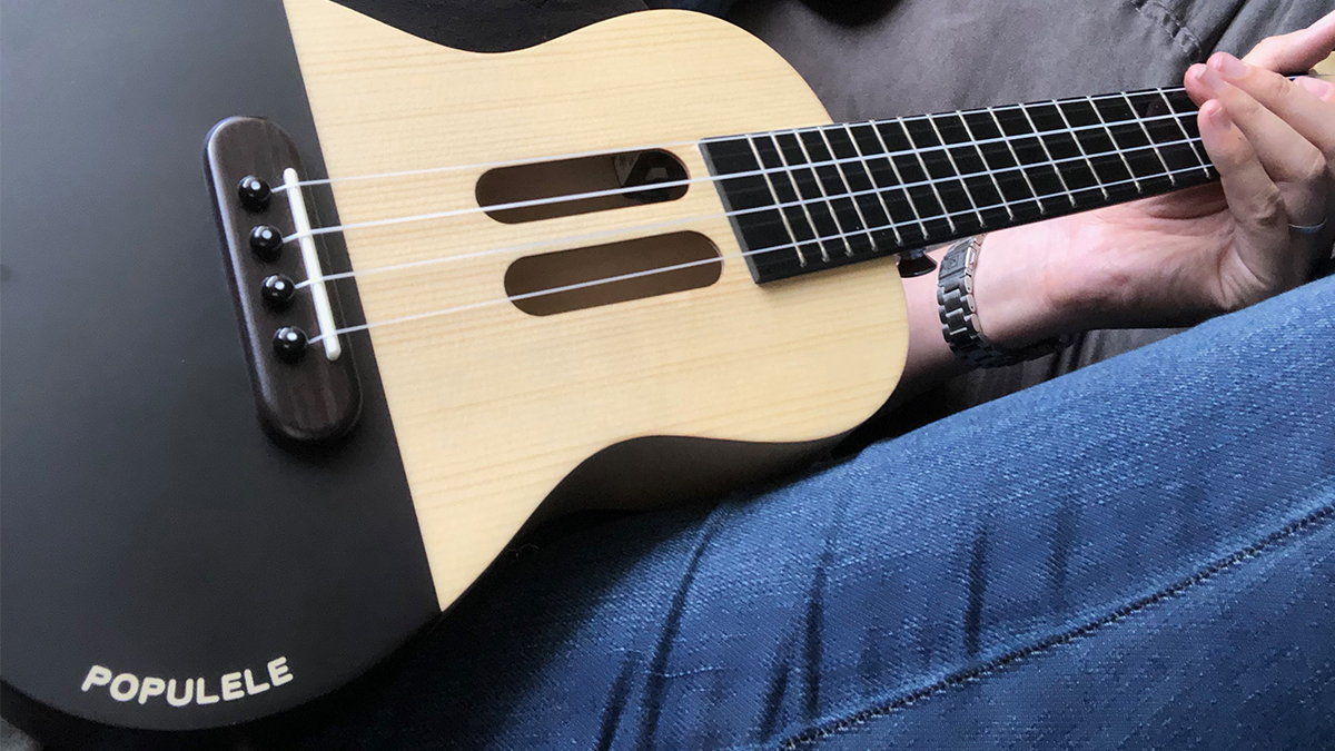 Playing the Populele \ Image: Dakster Sullivan