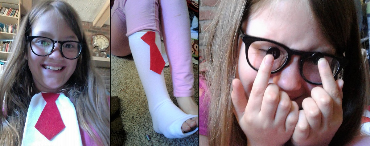 Girl modeling a sock with a red tie on her chest and leg, and then holding up two black buttons to her glasses.