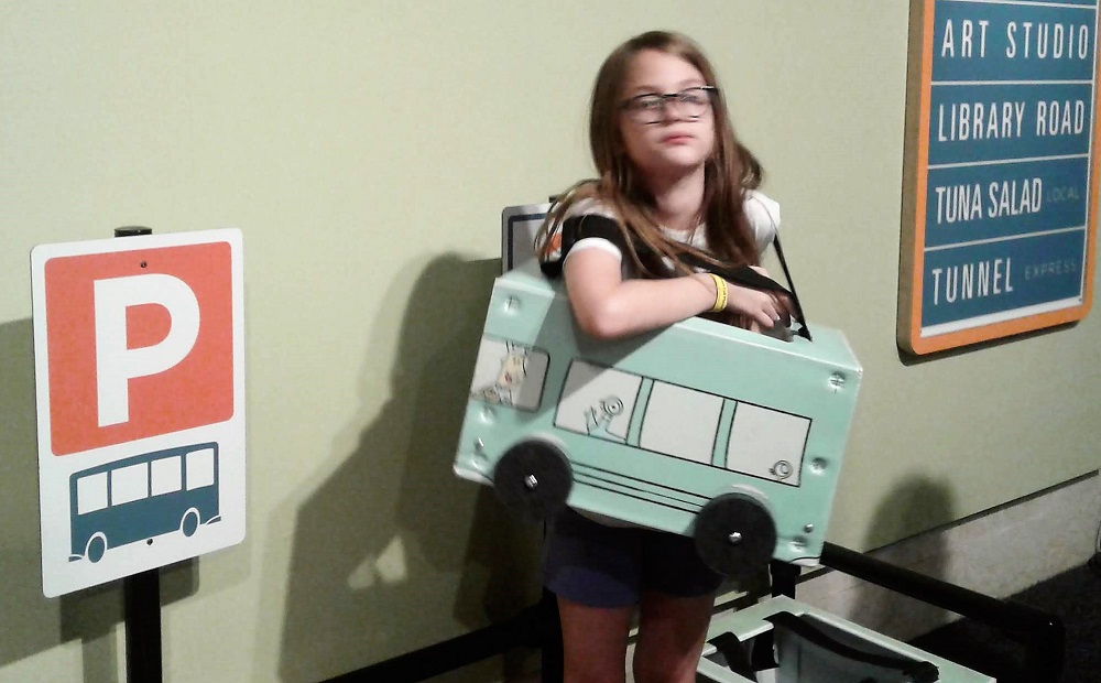 9yo stuck in a wearable Pigeon bus