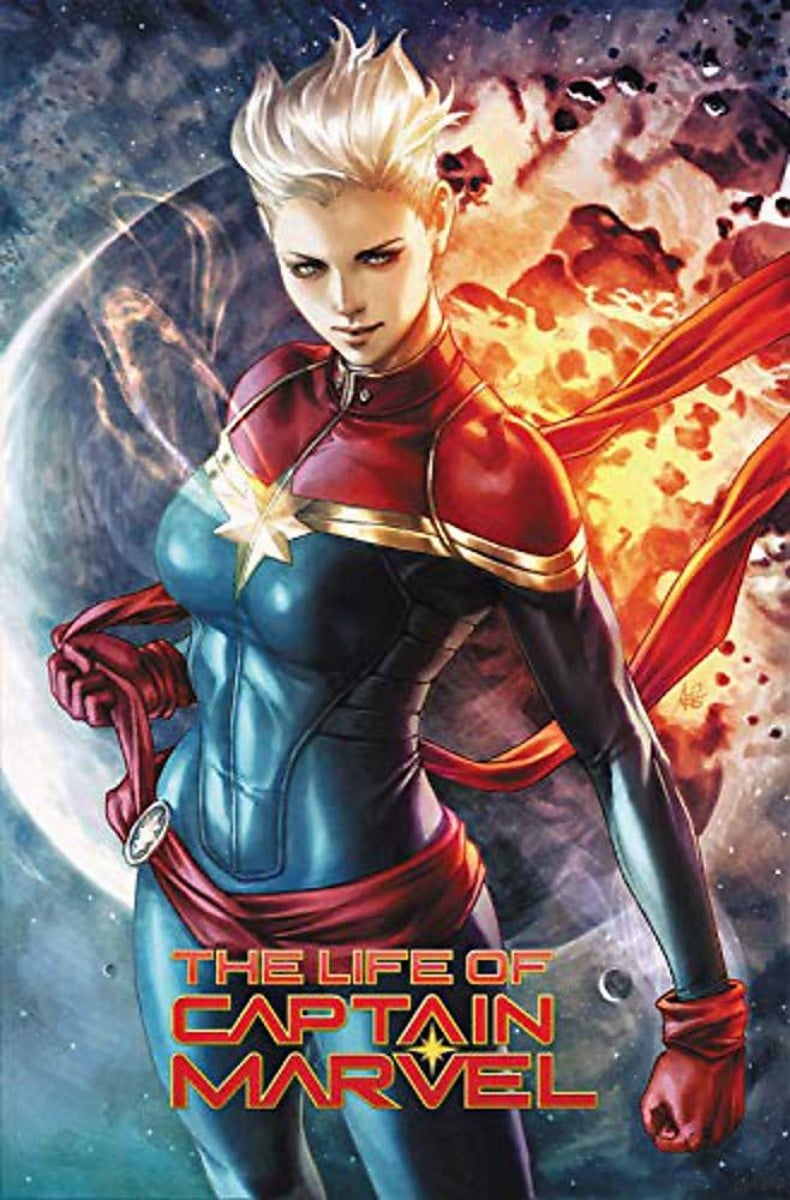 Captain Marvel with flame behind her. Text reads The Life Of Captain Marvel
